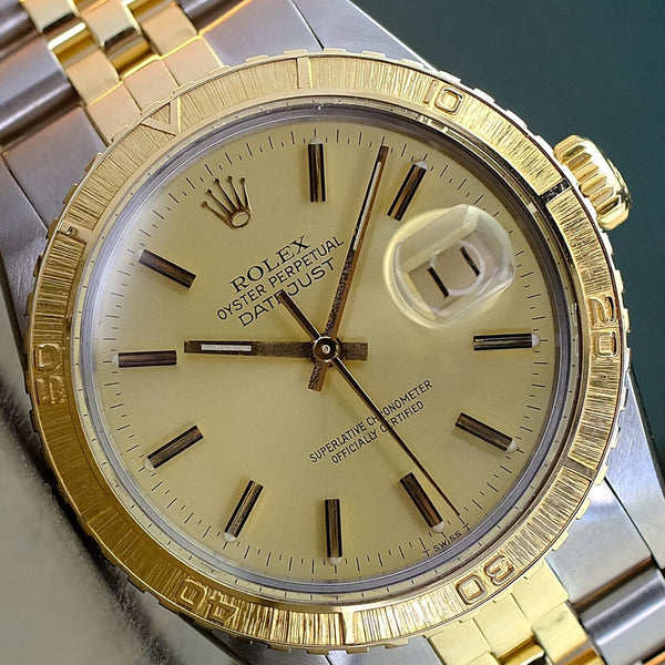 ROLEX MEN'S DATEJUST SS & GOLD CHAMPAGNE DIAL THUNDERBIRD BEZEL 16253 36MM WATCH